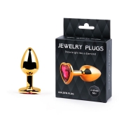 Золотистая анальная пробка с малиновым кристаллом-сердечком - 7 см. - Anal Jewelry Plug - купить с доставкой в Новороссийске